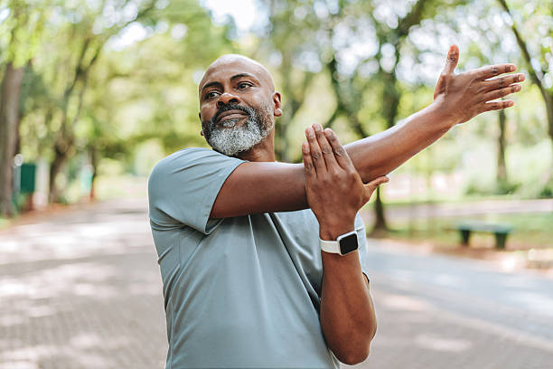 istock Portrait of a mature man doing stretching in public park 2249803731
