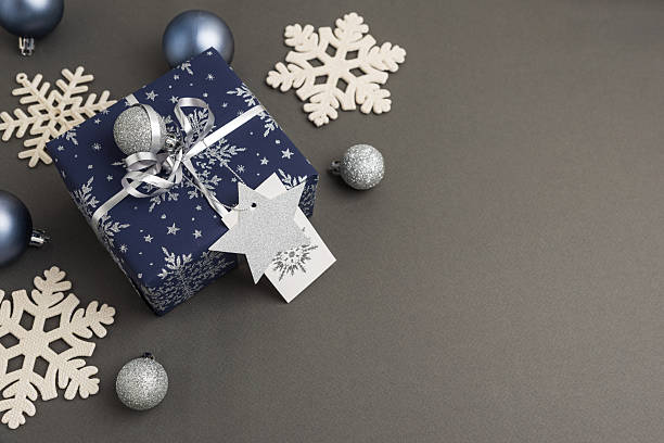 istock Blue Christmas Gift Boxes with Silver Ribbons and Snowflake Decorations 2249804223