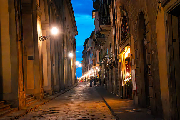 Florence, Italy. May, 18, 2023.Dark alley at night in Florence, Italy.