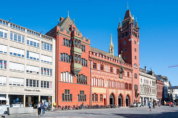 Basel, Switzerland - September 02, 2025: Rathaus Basel City showcases vibrant architecture during sunny day.