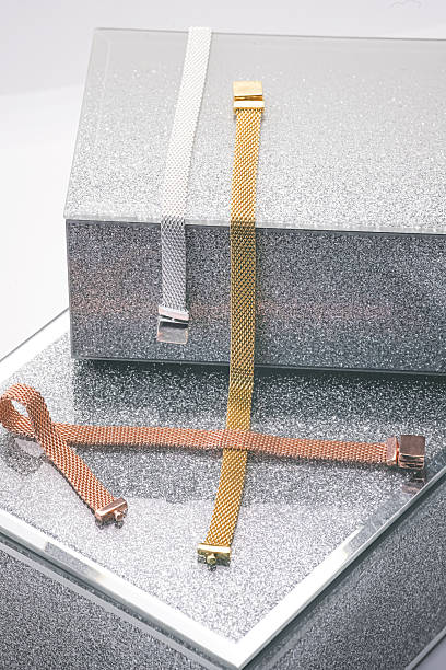 istock Luxury mesh jewelry bracelets displayed on glitter gift boxes, elegant accessories arranged as a premium present idea in a stylish and modern composition 2249812899