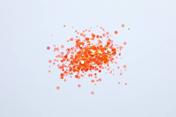 istock Beautiful orange confetti on a white background 2249818551