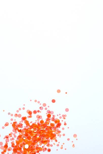 istock Beautiful orange confetti on a white background 2249818575