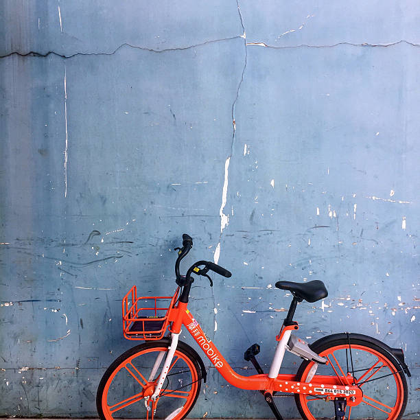 istock Orange Bike Blue Wall 2249820898