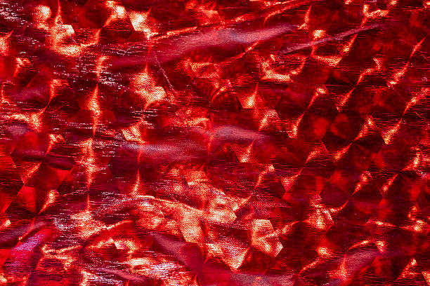 istock Vibrant red abstract texture with crystal-like facets and metallic glare 2249822387