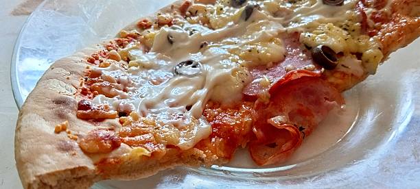 istock pork loin pizza with cream cheese 2249822431