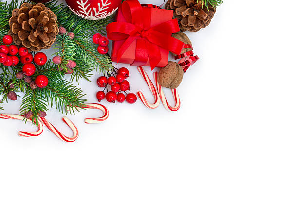 istock Christmas composition with gift box, red ornaments, candy canes and fir branches on white background. Top view, flat lay 2249822938