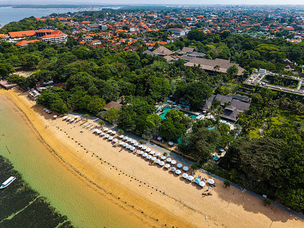 istock Tropical Beach with Parasols and Resort, Sanur, Bali 2249828196