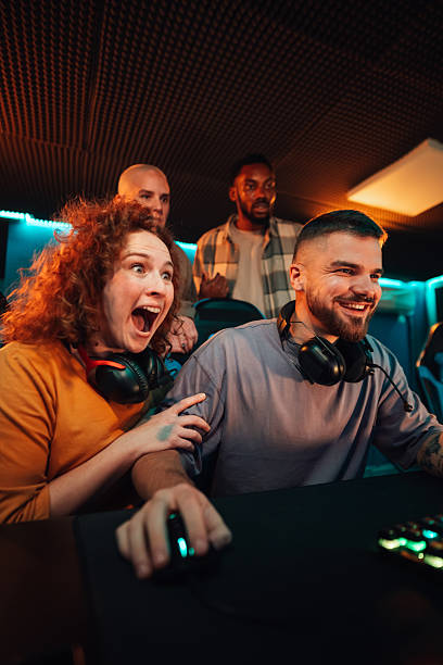 istock Friends playing exciting competitive video game together 2249833102