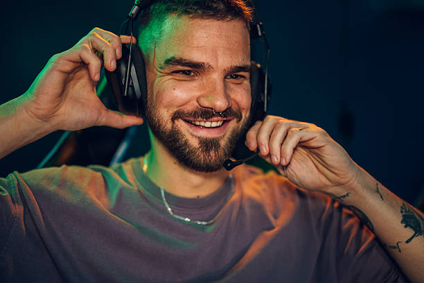 istock Happy male gamer enjoying online video gaming experience 2249833143