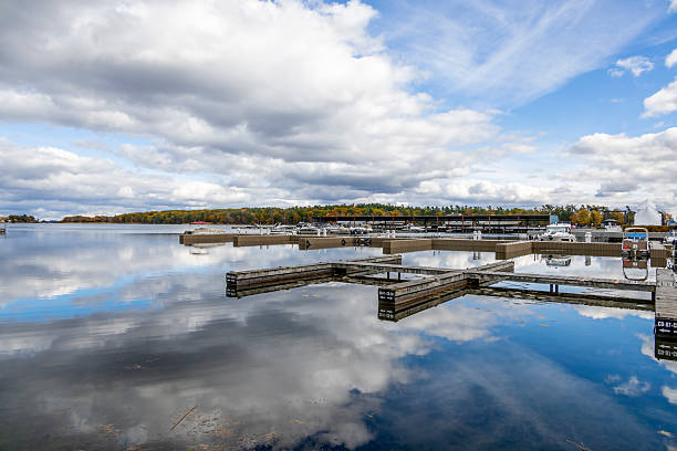 A serene view of Rockport Marina with calm waters and a cloudy sky, highlighting the beauty of this picturesque location in Ontario.