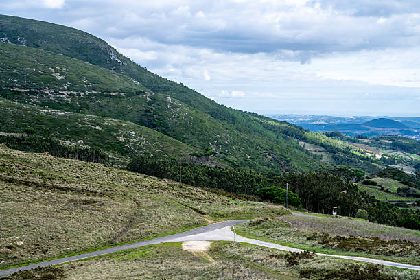 istock Forked rural road among Montejunto hills 2249839286