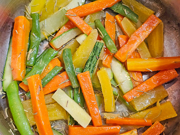 Thin French Green Beans (or Haricots Vert) with Carrots Roasted on Frying pan