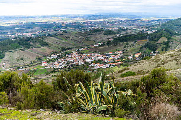 istock Hilltop village below Serra de Montejunto with agave plant 2249840276