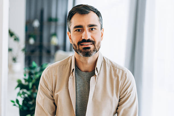 istock Middle-aged bearded man smiling confidently thoughtful and relaxed indoors 2249841524