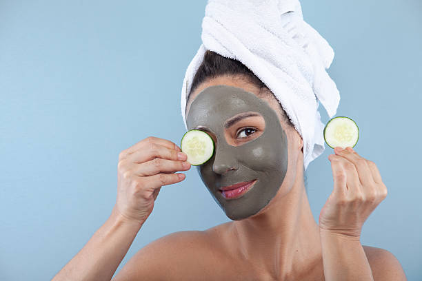 istock Facial treatment with cucumber slices over the eyes 2249842014