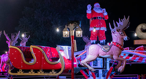 istock Empty Christmas Carousel with Red Seats and Reindeer Figures 2249842196