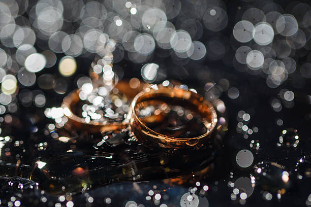 Wet Wedding rings laying in water