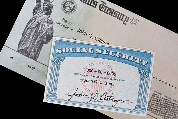 istock Fake Social security card on treasury department check 2249849235