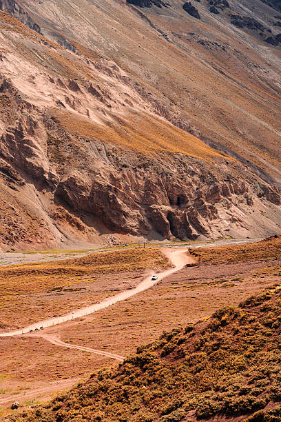 istock Winding road through dry mountains 2249851878