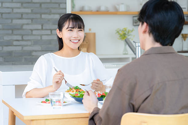 istock A young couple eating in the dining room 2249852061