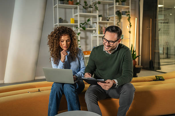 istock Business colleagues collaborating on laptop in modern office 2249853847
