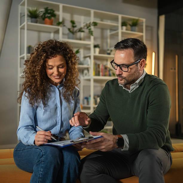 istock Business colleagues discussing contract signing in modern office 2249853890