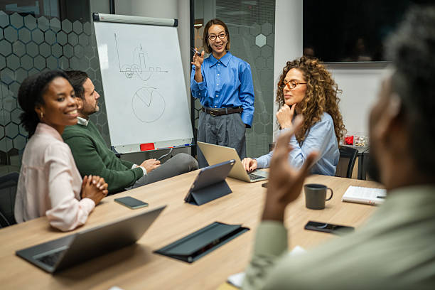 istock Business colleagues discussing data during corporate meeting in office 2249854894