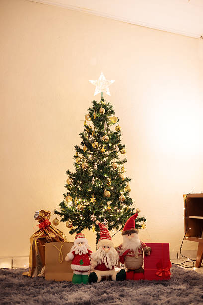 istock Cozy Christmas Tree in a Warm Living Room 2249854949