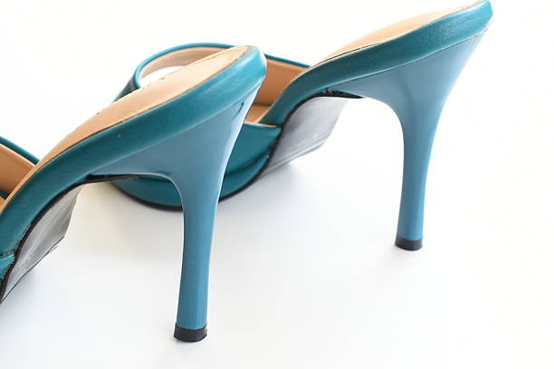 green high heels shoes on white background