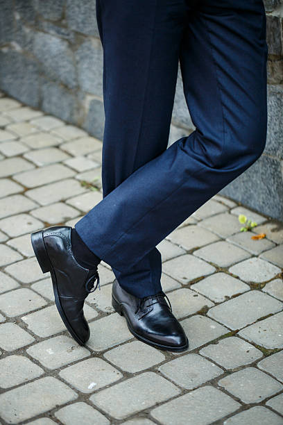 istock Man puts on a wedding suit and accessories on the wedding day. 2249859789