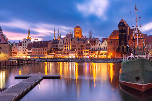 istock Old waterfront buildings in Gdansk Poland at night 2249868308