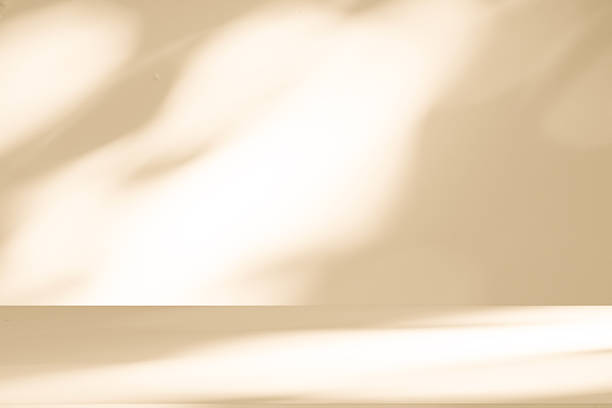 istock Studio style background wall decoration presentation uses white and beige tones. with shadows cast from a nearby window, concept creating a decorative 2249874233