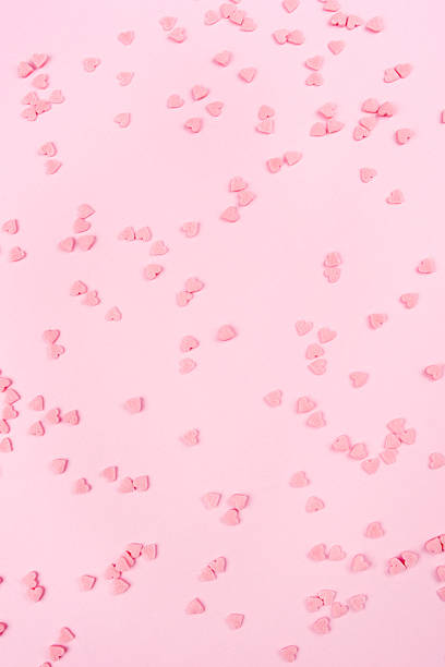 istock Pink background with tiny hearts. Valentine's day concept. 2249884477