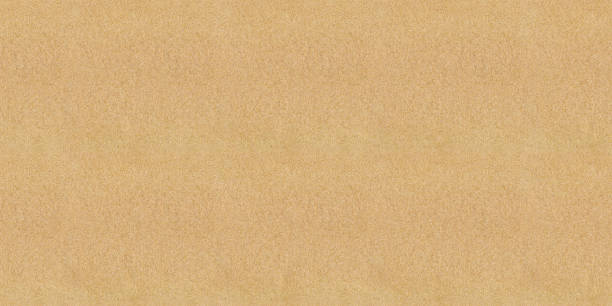 istock Brown kraft paper sheet - seamless background texture 2249884595