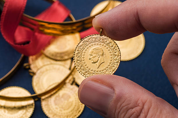 istock Traditional Turkish half gold coins and bracelets symbolizing wealth and prosperity 2249884703