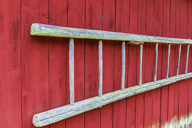istock Old weathered wooden ladder on a barn 2249893919
