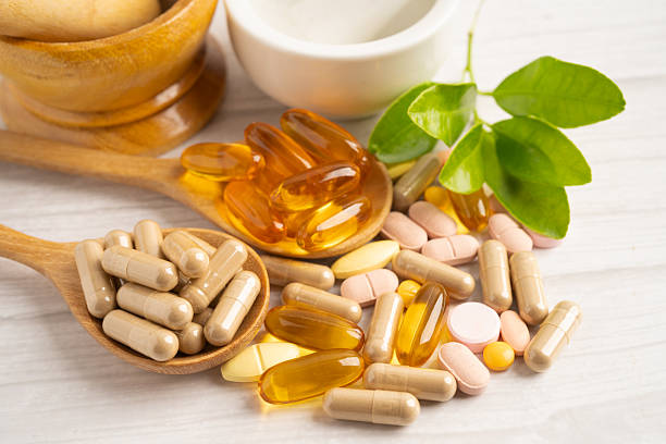 istock Alternative medicine herbal organic capsule drug herb. 2249896251