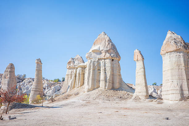 Review unique geological formations in Cappadocia, Turkey. Kappadokiets region, with its valleys, gorges, hills, located between the volcanic mountains in Goreme National Park.