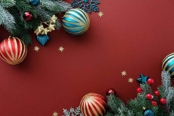 istock Christmas background with Xmas tree, Christmas red and teal decorations and on red table. Flat lay, top view. 2249897835