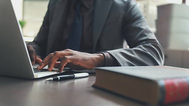 istock Lawyer using laptop in office 2249898026