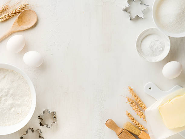 istock Culinary background with Ingredients for cooking Christmas baking on old white wooden background table. Top view. Christmas holiday kitchen background. Design element. 2249898105