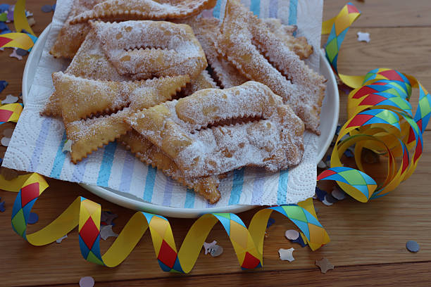 istock Italian sweet crisp pastry deep-fried and sprinkled with sugar on table 2249898119