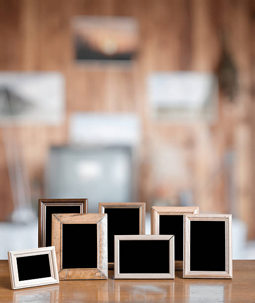 istock photo frames on the wooden table 2249898391