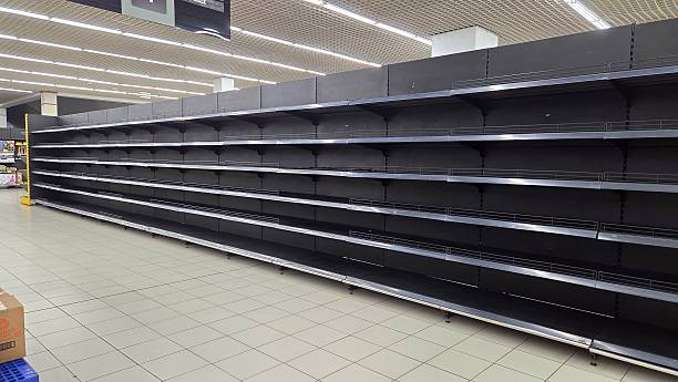 istock Display shelves in the supermarket that are empty because it has ceased operations. 2249898870