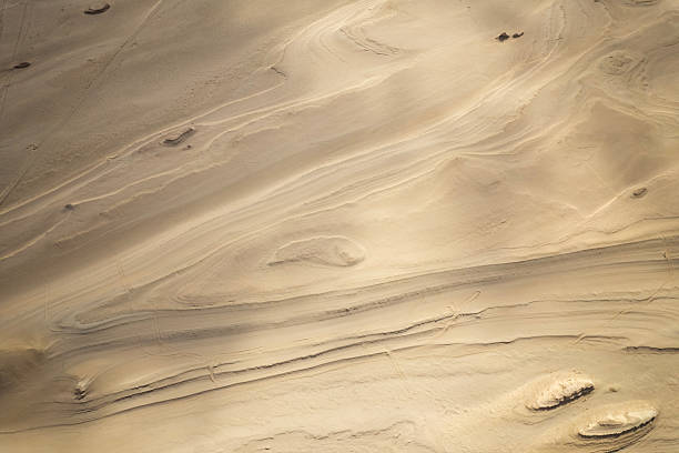 The Gansu Yardang Landform features dramatic wind-eroded ridges, cliffs, and sculpted rock formations that stretch across a vast desert landscape. Shaped over thousands of years by strong winds and sand, it is one of China’s most unique and otherworldly geological wonders.