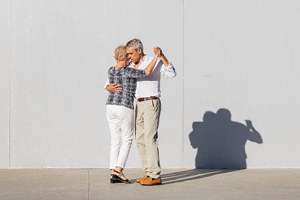 istock Senior couple dancing tango with passion 2249907197