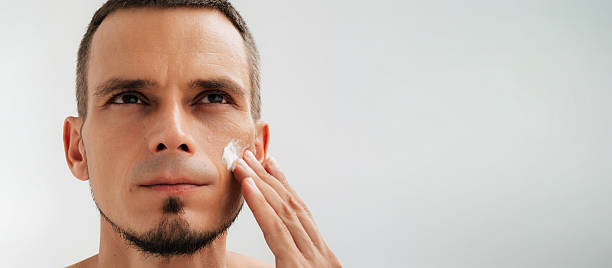 istock A man with a face cream applied to his skin 2249908538