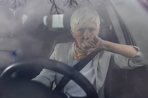 istock Woman looking thoughtfully while driving in city 2249909138