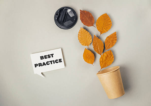 istock Creative composition featuring autumn leaves emerging from a paper cup beside a coffee lid, symbolizing sustainability and best practices in environmental awareness 2249909195
